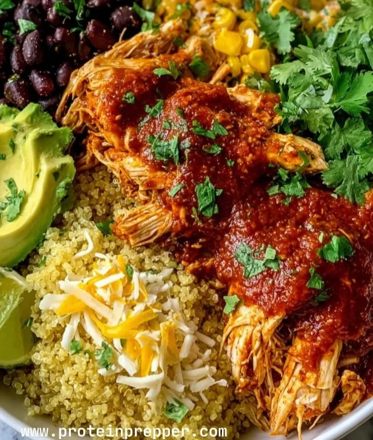 High protein chicken enchilada bowl with toppings and garnishes