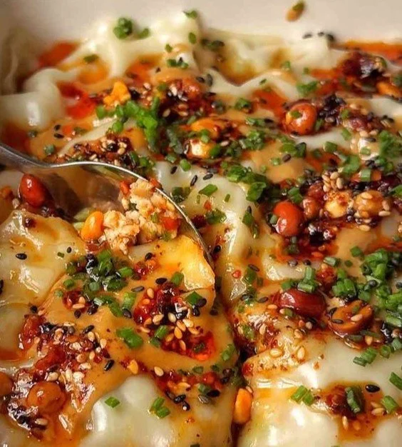 Viral Dumpling Lasagna showcasing layers of dumplings and cheese