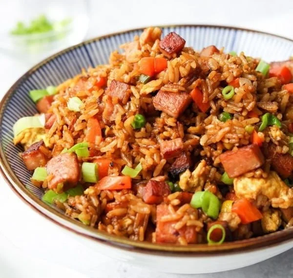 Plate of delicious Spam Fried Rice with vegetables and egg