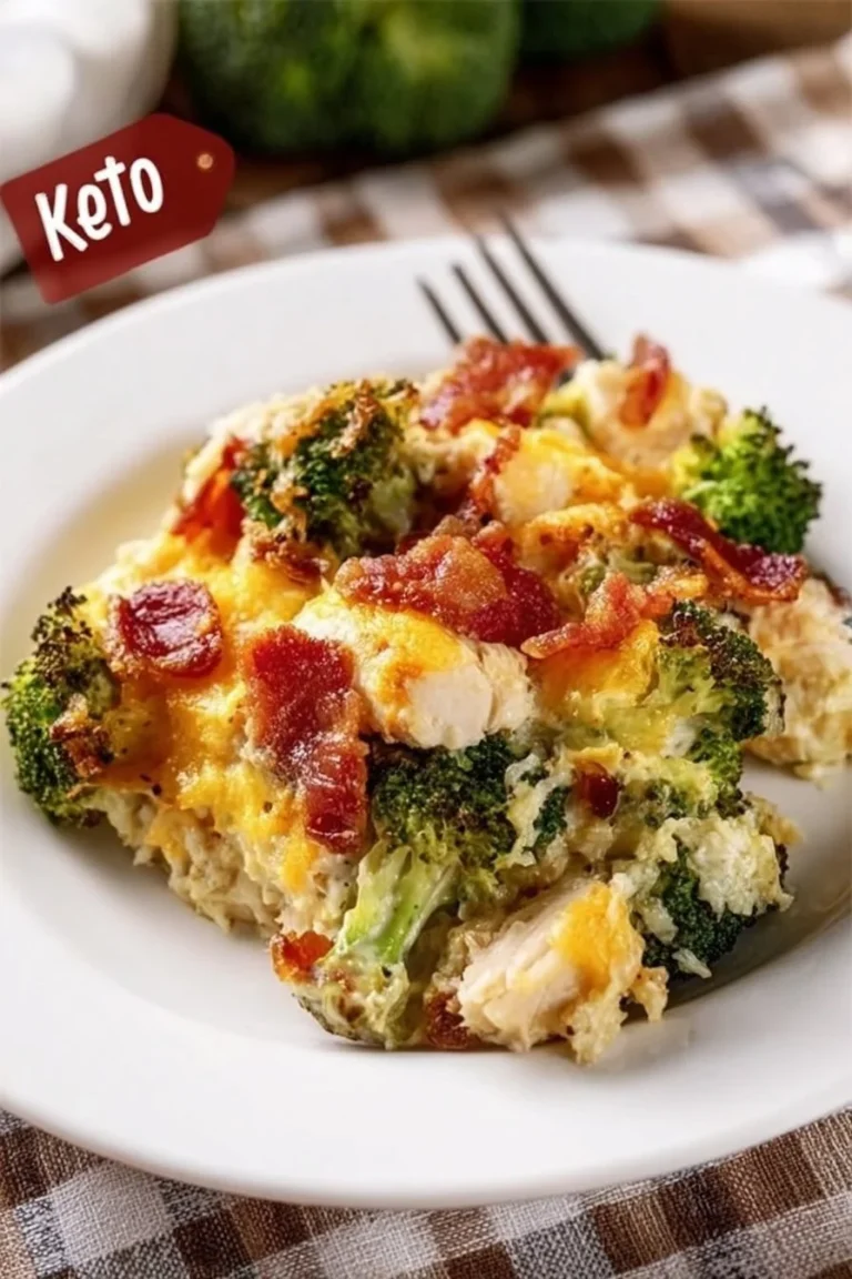 A hearty low carb casserole topped with cheese and vegetables, perfect for a healthy meal.